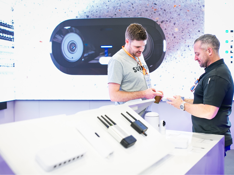 visitors discovering new av products at Integrate